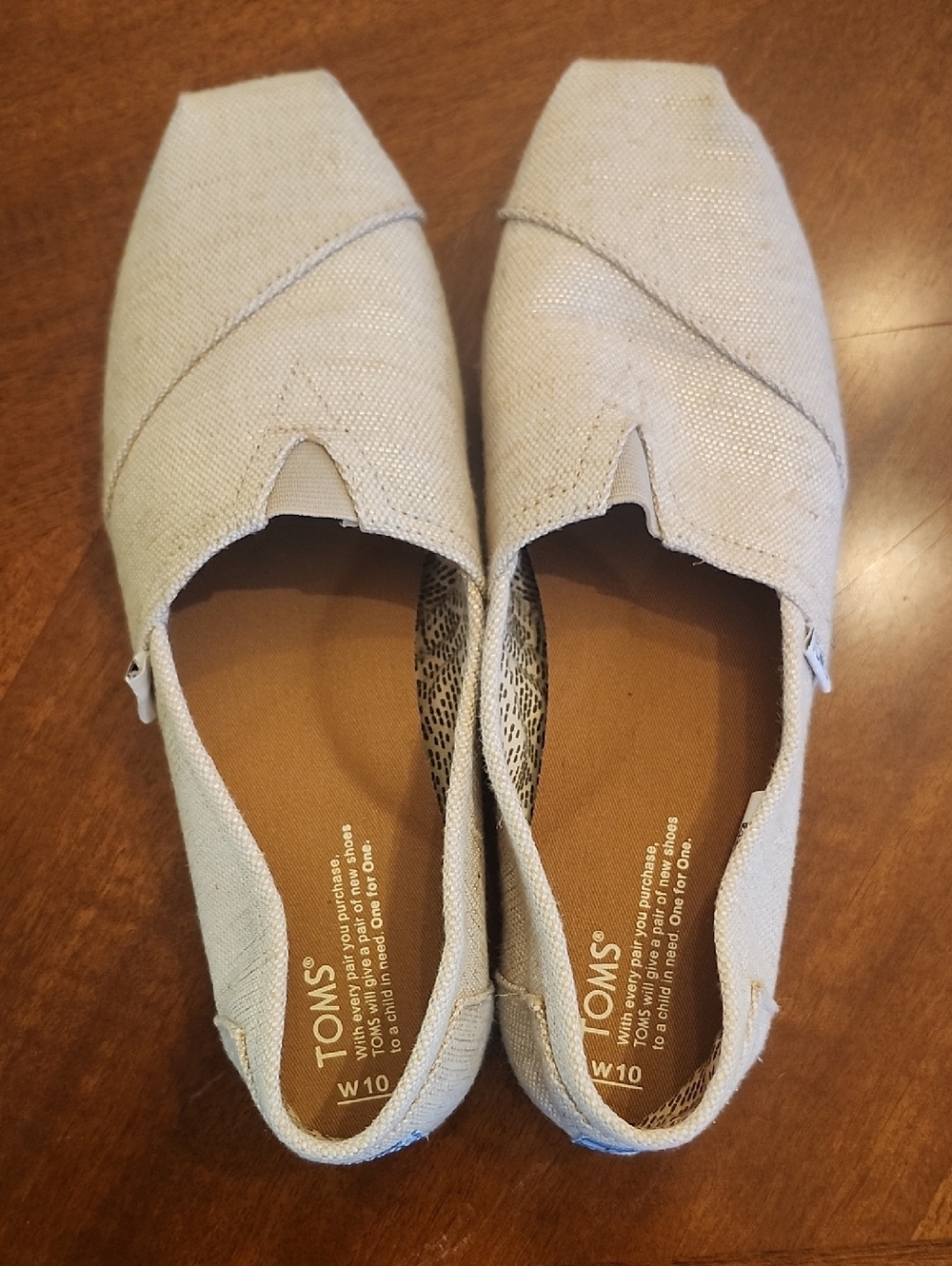 TOMS Women's Light Tan Canvas Slip-Ons